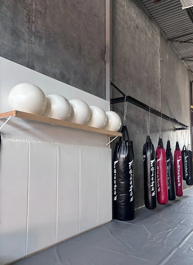 Heavy bag rack in the striking area of the Mission BJJ facility in Mission, BC